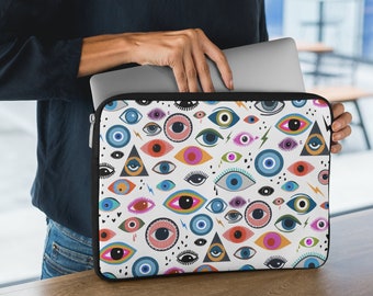 Funda y mochila para portátil con diseño de ojo malvado de colores: diseño espiritual protector. Regalo navideño divertido para gánsteres espirituales y almas modernas.