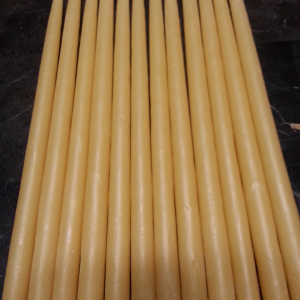 One dozen beeswax skinny tapers hand dipped