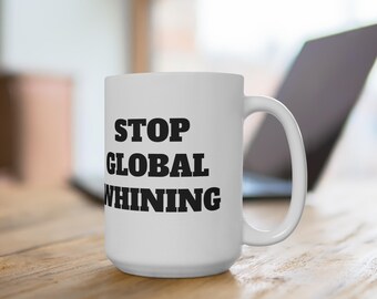 May include: White ceramic coffee mug with black text that reads "STOP GLOBAL WHINING".