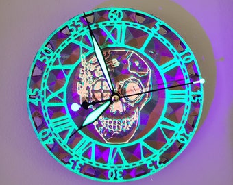 Glow in the Dark / Blacklight Day of the Dead Wall Clock.  Day of the Dead Clock with Glow in the Dark / Blacklight reactive features.