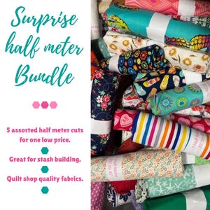 May include: A collection of fabric rolls with various patterns, including floral and striped designs. The image displays text: "Surprise half meter Bundle" and "5 assorted half meter cuts for one low price."