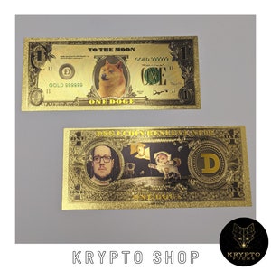 Peut inclure: Deux billets de banque de couleur or avec un thème de mème Doge. Le premier billet représente un chien Shiba Inu avec le texte "To the Moon" et "One Doge". Le deuxième billet représente un chien astronaute de dessin animé avec le texte "DogeCoin Heavenly Note" et "One Doge".