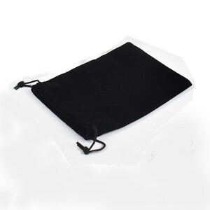 May include: A black velvet drawstring pouch with a black cord.