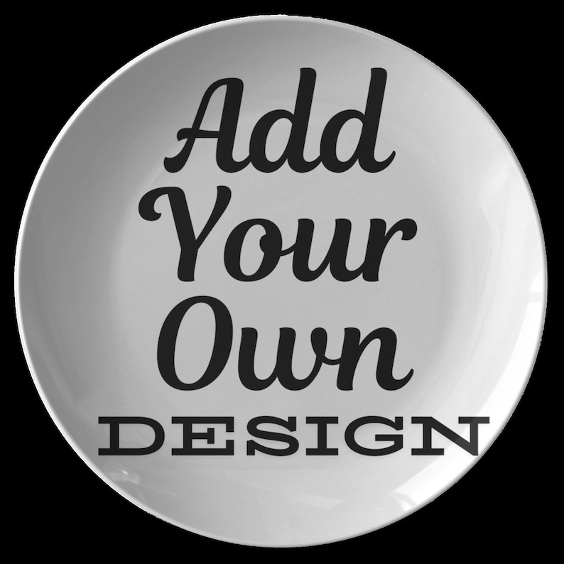 May include: White ceramic plate with the text "Add Your Own DESIGN" in black.