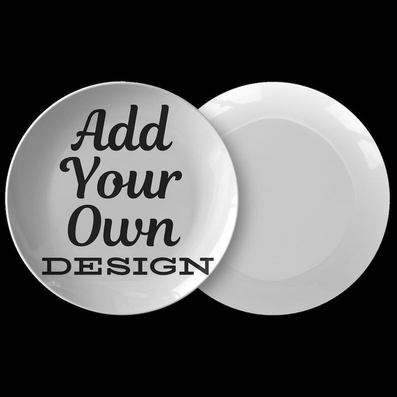 May include: Two white ceramic plates, one with the text "Add Your Own DESIGN" in black.