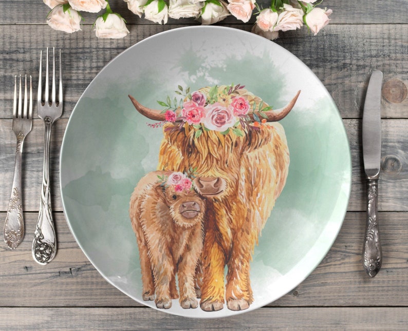 Watercolor Hereford farm floral cow and calf white round dinner plate, made of a polymer composite which is oven safe, microwave safe, and dishwasher safe. Thermosaf. Farmhouse dinnerware.