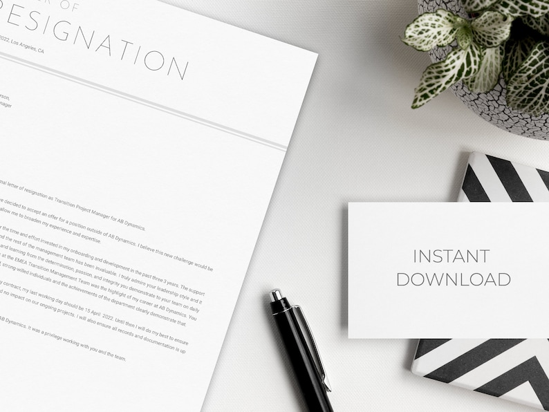 May include: A white sheet of paper with the text "Letter of Resignation" at the top. The text is in a black sans-serif font. The paper is on a white surface with a small potted plant and a black and white striped box in the background. The box has a white card on top with the text "Instant Download" in black sans-serif font.