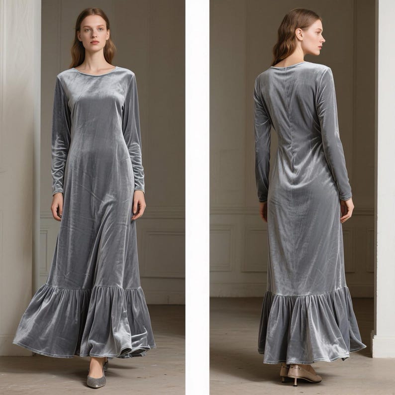 May include: A long, gray velvet dress with long sleeves and a ruffled hem. The dress has a round neckline and a flowing silhouette. The fabric has a soft, lustrous appearance. The dress is suitable for formal occasions.