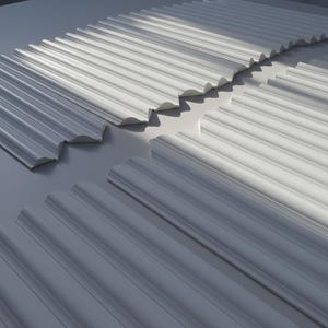 White decorative molding pieces with a fluted design. The pieces are arranged in a pattern, with shadows creating depth. The molding has a scalloped edge and is likely for interior design or architectural use.