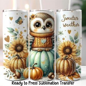 May include: Three white tumblers with fall-themed designs. One features an owl in a sweater on a pumpkin, the others have sunflowers and pumpkins. The text "Sweater weather" is on one. "Ready to Press Sublimation Transfer" is at the bottom.