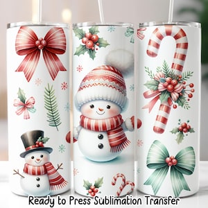 May include: Three white sublimation tumblers with Christmas-themed designs. One features a snowman, another a candy cane, and the third a red bow. The tumblers have a white background with festive elements like holly and snowflakes. The text "Ready to Press Sublimation Transfer" is at the bottom.