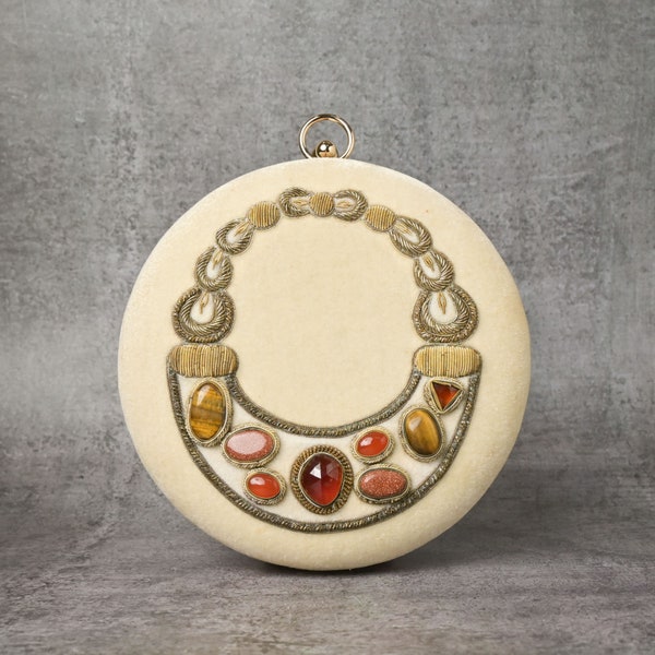 Opulent Round Embroidered Shoulder Bag embellished with stones is a perfect piece to compliment your beautiful hands/wrist. Standout in it.