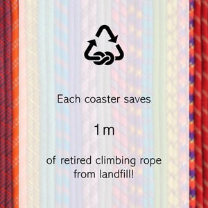 May include: A collection of colorful climbing ropes arranged vertically. A central white overlay features a black recycling symbol and the text: Each coaster saves 1 m of retired climbing rope from landfill! The ropes display various patterns.