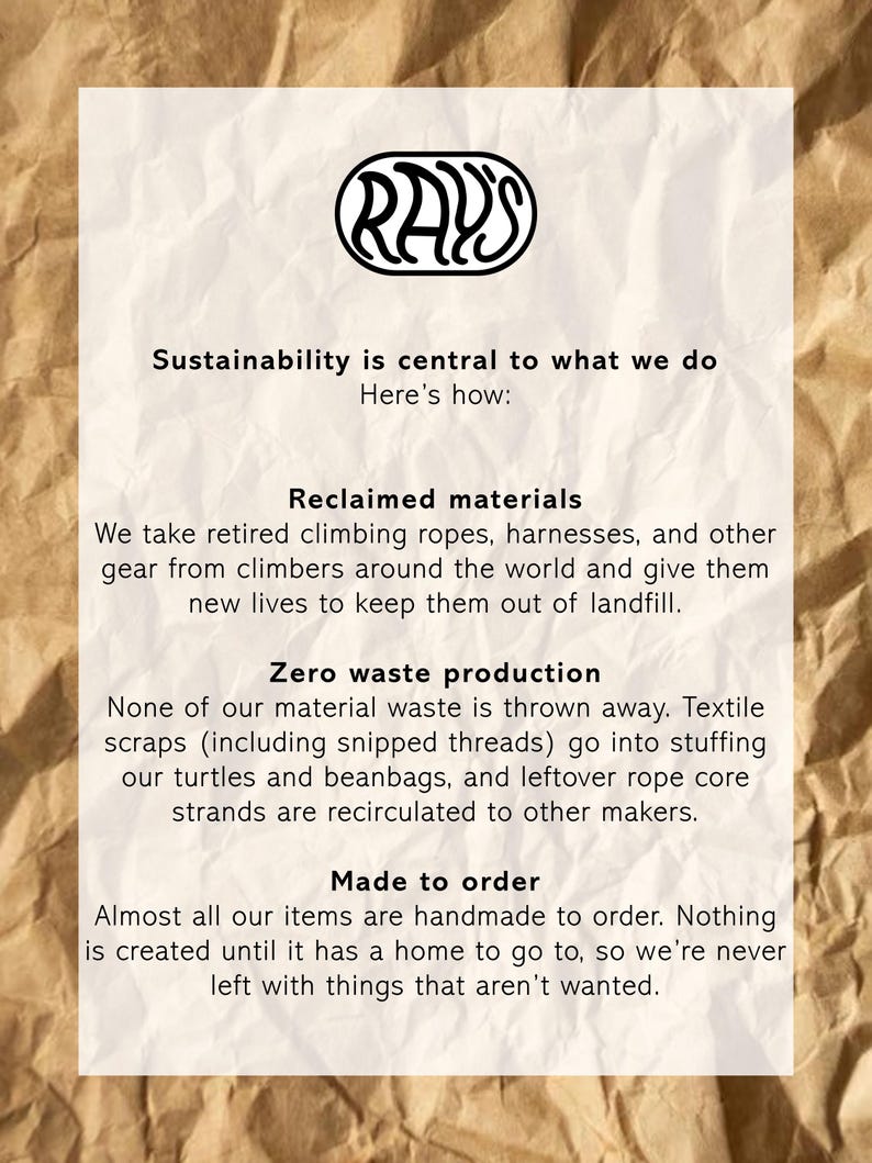 May include: A white informational sign with black text on a crumpled brown paper background. The text reads: RAY'S, Sustainability is central to what we do, Here's how: Reclaimed materials, Zero waste production, and Made to order with descriptions.