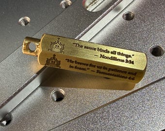 Llavero de latón con sabiduría pastafariana