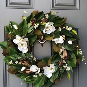 Magnolia wreath for front door with realistic white magnolia blooms nestled in green magnolia leaves with pods, ferns,blossoms all handmade. image 9