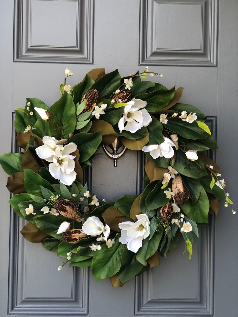 Magnolia wreath for front door with realistic white magnolia blooms nestled in green magnolia leaves with pods, ferns,blossoms all handmade. image 9