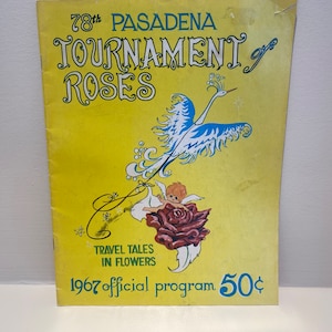 May include: Vintage 1967 Pasadena Tournament of Roses official program. The cover is yellow with the title in large, ornate lettering. A blue and white bird illustration and a cherub with a rose are featured. The price is 50¢.