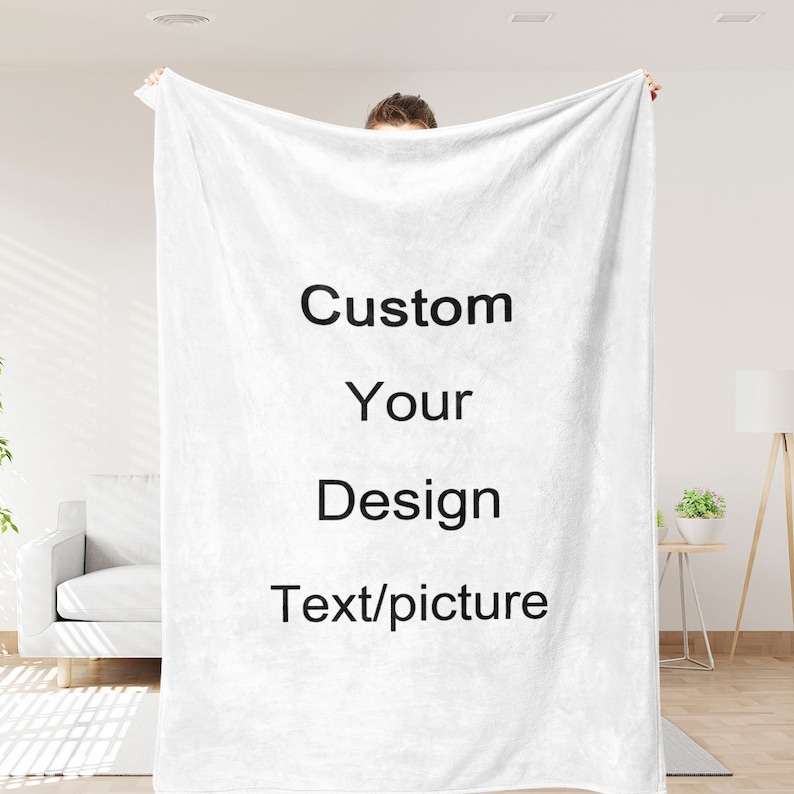 May include: White fleece blanket with the text "Custom Your Design Text/picture" printed on it.