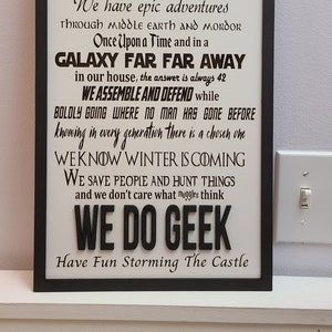 We Do Geek 17 inches  x 10.5 inches White background w/ black frame--2 layer. multi- variations available