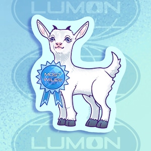 May include: A white goat with blue eyes and a blue ribbon with the text "Most Wiles" on it. The goat is standing on a light blue background.