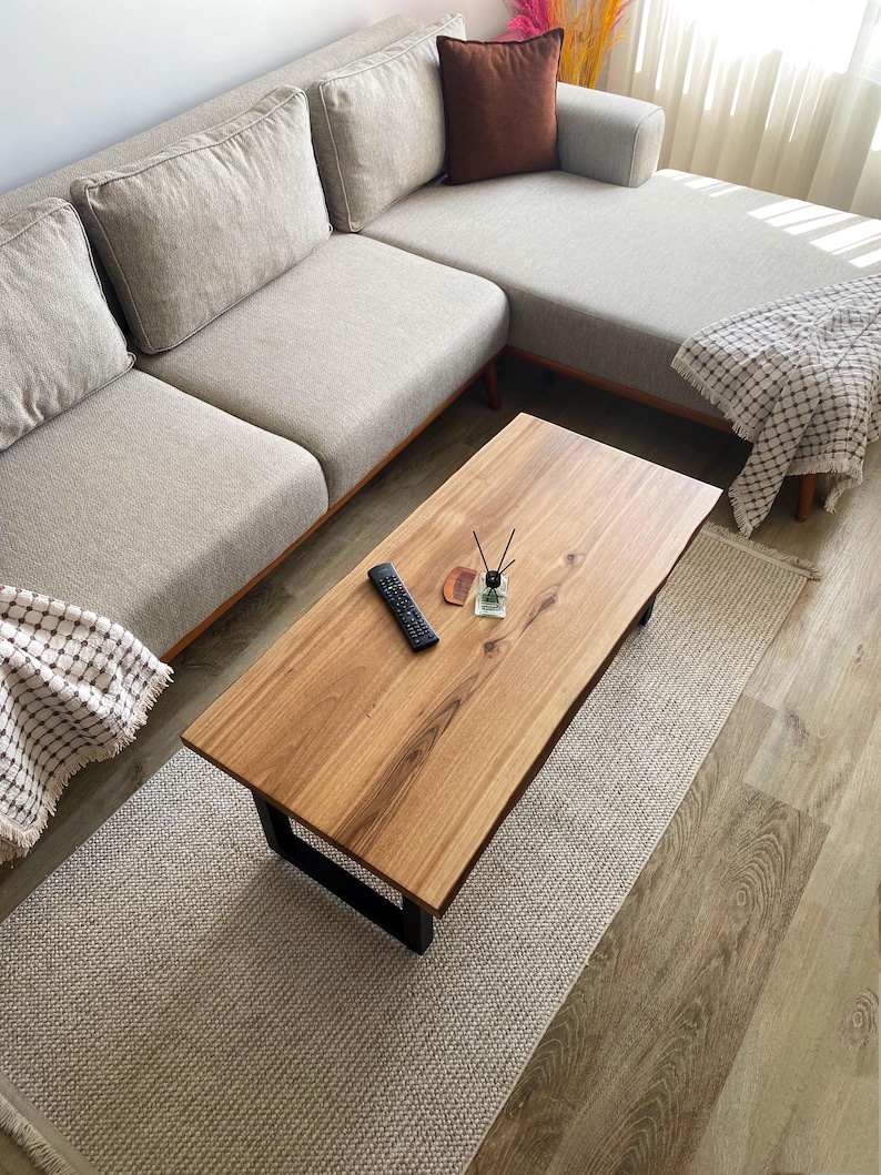 The nice look that a walnut coffee table adds to modern living room