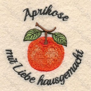 May include: Embroidered design featuring an orange apricot with green leaves and a brown stem. The text "Aprikose" is above the fruit, and "mit Liebe hausgemacht" is below. The design is on a cream-colored fabric.