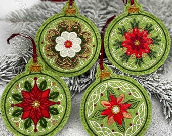 May include: Four green felt Christmas ornaments with embroidered designs. Each ornament features a different floral pattern in red, white, and gold thread. The ornaments are perfect for adding a touch of handmade charm to your holiday decor.