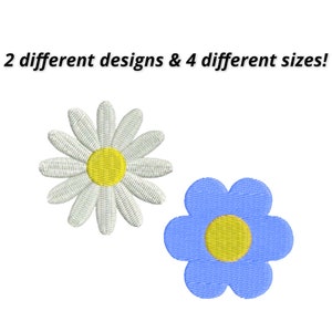 Könnte beinhalten: Zwei gestickte Blumenmotive, eine weiße Margerite mit gelber Mitte und eine blaue Blume mit gelber Mitte.