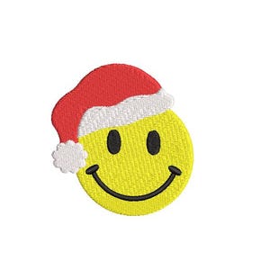 May include: Embroidered yellow smiley face wearing a red and white Santa hat. The smiley face has black eyes and a curved black mouth. The design is likely for a patch or applique.