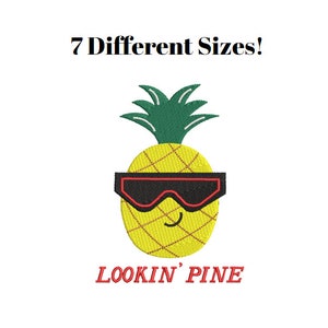 May include: A yellow pineapple with a green leafy crown and black sunglasses with red accents. The pineapple has a smiling face and the text "LOOKIN' PINE" is below it.