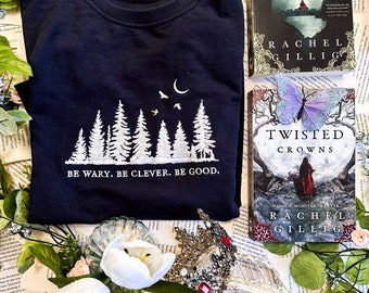 Be Wary, Be Clever, Be Good Embroidered Crewneck Sweatshirt, Officially Licensed One Dark Window The Shepherd King by Rachel Gillig Merch