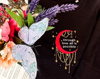 Through Love, All is Possible Embroidered Sarah J. Maas Licensed Unisex organic sweatshirt