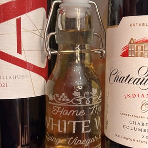Optional Limited Edition Engraved 4  oz swing-top bottle. Perfect for gifting!