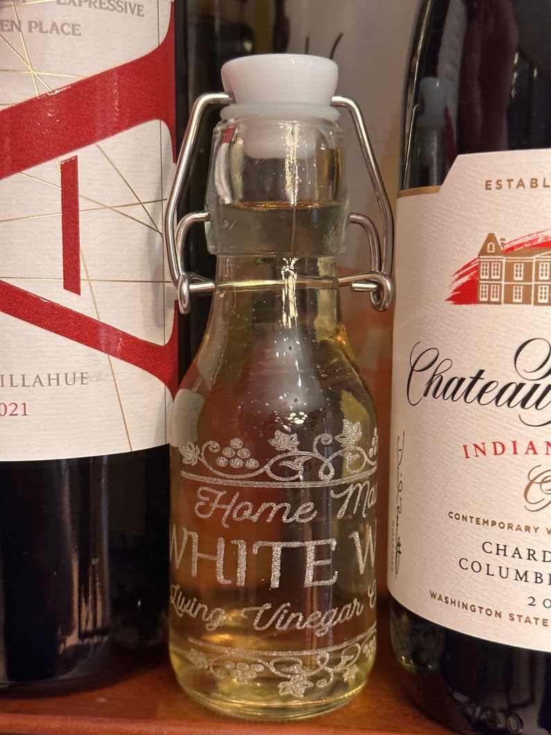 Optional Limited Edition Engraved 4  oz swing-top bottle. Perfect for gifting!