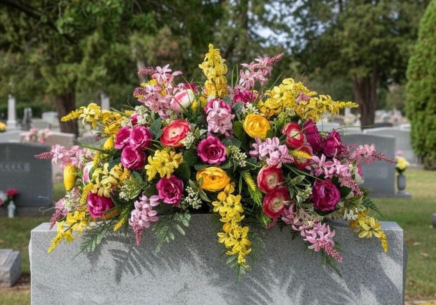 Pink and Yellow. Ranunculus, and Roses Grave Flower Arrangement ...