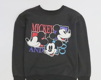 Sudadera vintage de Mickey Mouse de Disney con cuello redondo, talla mediana.