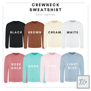 May include: A display of ten crewneck sweatshirts in various colors, including black, brown, cream, white, rose gold, aqua, pink, and light blue. The text "CREWNECK SWEATSHIRT" and "Color Options" are displayed at the top of the image.