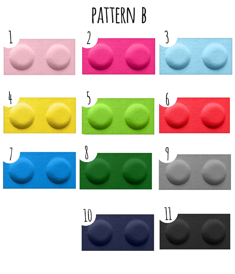 K&ouml;nnte beinhalten: Muster B zeigt 11 verschiedene Farben von Plastikbausteinen. Jeder Baustein hat zwei runde Noppen oben. Die Farben sind rosa, pink, hellblau, gelb, gr&uuml;n, rot, blau, dunkelgr&uuml;n, grau, dunkelblau und schwarz.