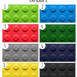 K&ouml;nnte beinhalten: Acht unterschiedlich farbige Quadrate mit einem Muster aus sechs Kreisen auf jedem. Die Quadrate sind von 1 bis 8 nummeriert. Die Farben sind gr&uuml;n, blau, rot, gr&uuml;n, grau, dunkelblau, gelb und schwarz.