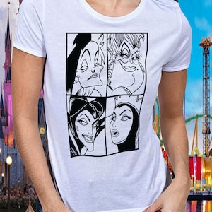 Puede incluir: Camiseta blanca con un estampado gr&aacute;fico en blanco y negro de cuatro personajes villanos de Disney: &Uacute;rsula, Mal&eacute;fica, Cruella de Vil y la Reina Malvada.