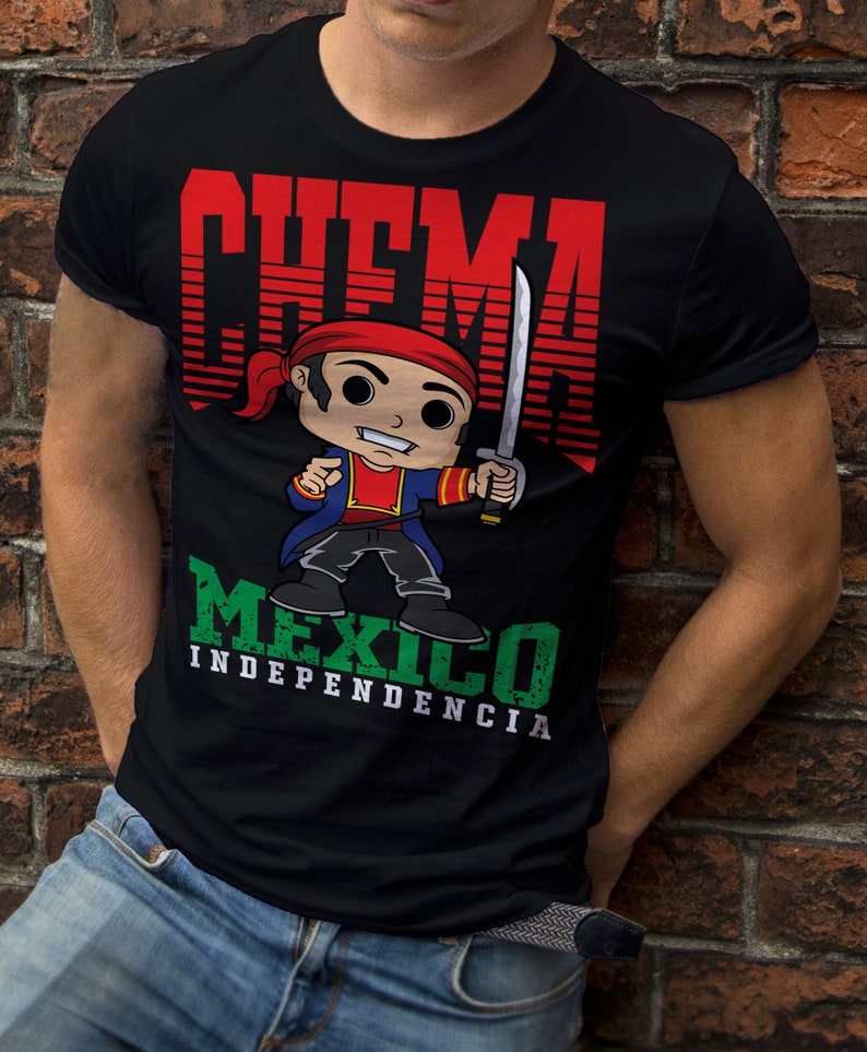 May include: Black t-shirt with a cartoon illustration of a man wearing a red bandana and holding a sword. The text "CHEMA MEXICO INDEPENDENCIA" is printed on the shirt.