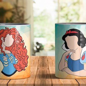 May include: Two white ceramic mugs with a gray rim. The mug on the left features a cartoon illustration of Merida from Brave with long red hair. The mug on the right features a cartoon illustration of Snow White with black hair and a red bow. Both mugs have a yellow, orange, and blue background.