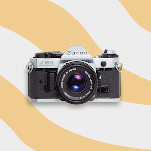 【Canon / キャノン 】AE-1 PROGRAMフィルムカメラ レトロ Amazon | Canon AE-1 35mmフィルムカメラ 50mm 1:1.8レンズ付き