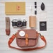 Canon AE-1 35mm Film Camera Bundle with Strap, Bag, and more! 
