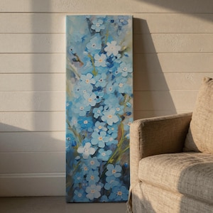 May include: A vertical rectangular canvas painting featuring a dense cluster of light blue and white forget-me-not flowers with yellow centers. The artwork uses thick, textured brushstrokes to create a layered, impasto effect across the surface.
