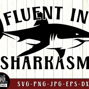 May include: Black and white graphic design featuring a shark with the text "Fluent in Sharkasm".
