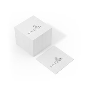 May include: A stack of white square napkins with a black and white illustration of a rabbit and the text "30 & Flirty" printed on them. One napkin is separate from the stack.