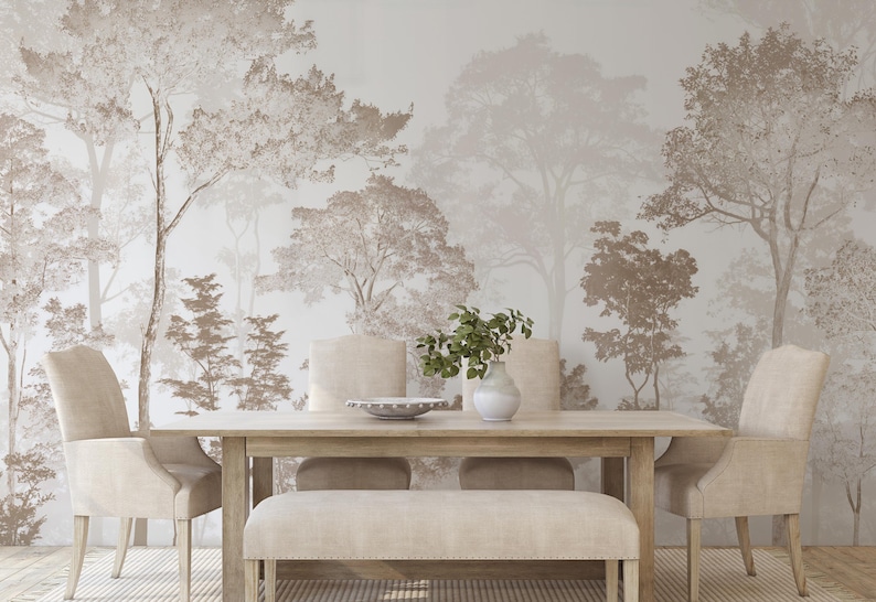 May include: A dining room set featuring a rectangular wooden table, a long upholstered bench, and two upholstered chairs. The wall behind the furniture is covered in wallpaper depicting a forest scene in shades of beige and light brown.