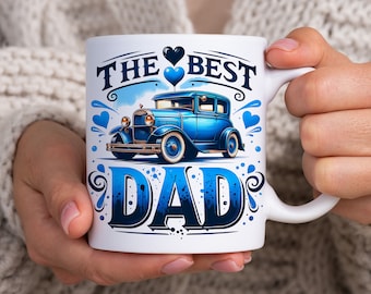 May include: White ceramic mug featuring the text "THE BEST DAD" in blue script with a vintage blue car illustration. The design includes blue hearts and decorative swirls. The mug has a white handle.
